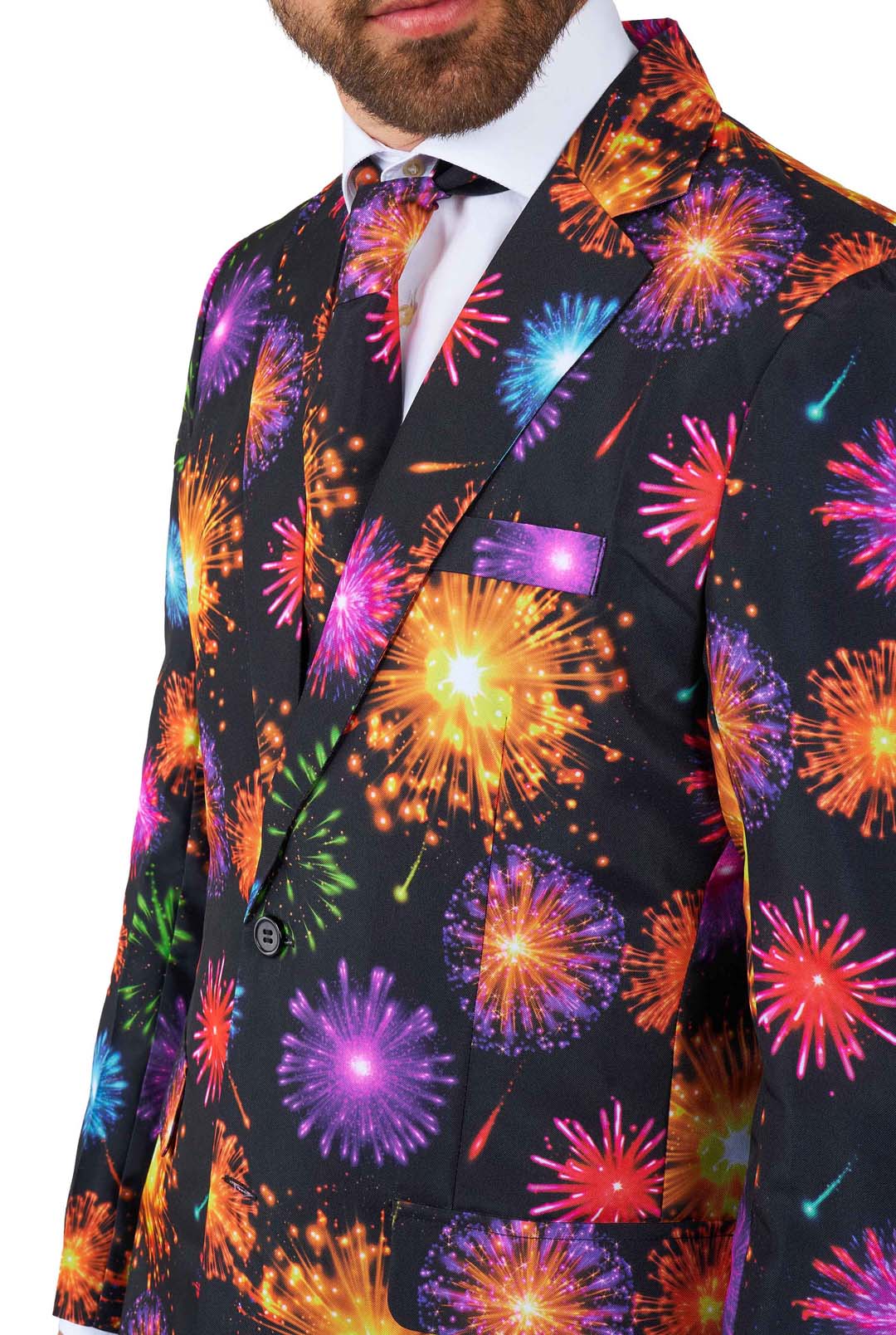 A person dressed in Suitmeister's "Fireworks Black" suit and tie, featuring a vibrant pattern of fireworks in bright colors such as orange, purple, and blue set against a black background. The suit jacket comes complete with a matching pocket square.