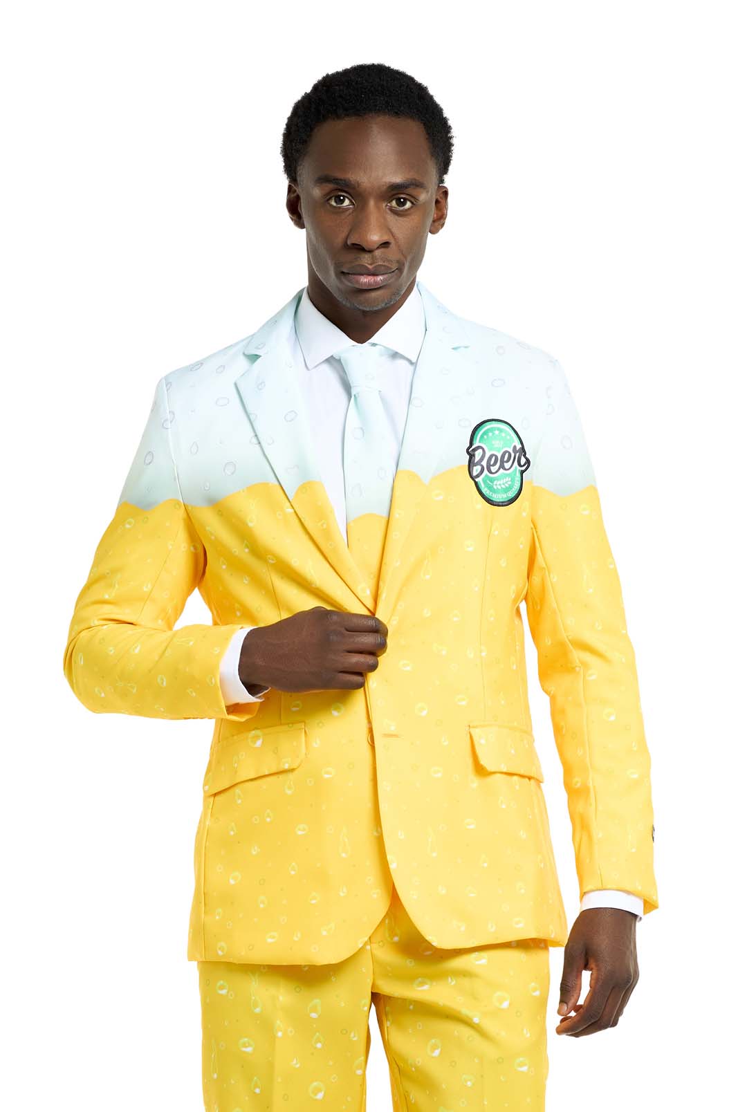 A person is wearing the Suitmeister Premium Beer Yellow suit, featuring a pattern that mimics a glass of beer with its yellow hue resembling the beverage and white at the top like foam. There is a patch on the jacket displaying the word "beer." The individual is adjusting the button on their jacket.