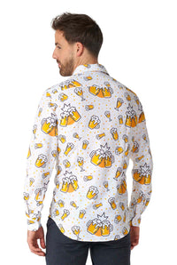 A person is wearing the Beer Shirt by Suitmeister, a white long-sleeve shirt featuring a vibrant pattern of frothy beer mugs. The individual is standing with their back slightly turned toward the camera, showcasing the shirt's playful design.