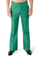 A man is wearing the Disco Suit Green flared pants from Suitmeister and black shoes, standing against a white background. The pants feature a button and zipper closure.