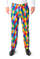 The outfit features the "Harleclown - Mardi Gras suit" by Suitmeister, which boasts vibrant diamond-patterned pants in bold colors such as red, blue, yellow, and green. It is paired with a white shirt and black shoes, emphasizing the lower half of the ensemble.