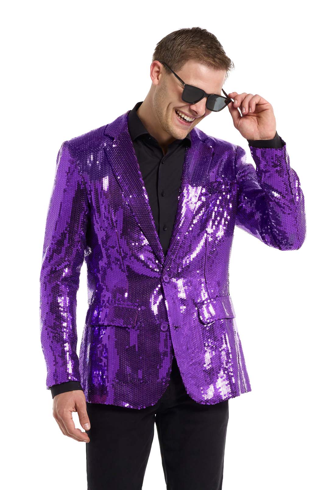 A man wearing sunglasses grins as he adjusts them. He's styled in the Suitmeister Sequins Blazer Purple over a black shirt and pants against a plain white background.