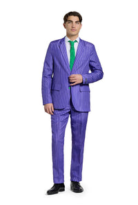 A person dressed in "The Joker" by Suitmeister, featuring a purple pinstripe suit and a green tie, stands against a white background.