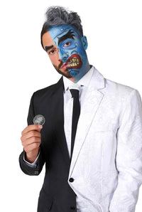 A man wearing the Two Face™ suit from Suitmeister holds a coin. His face features a dual design, half painted blue with exaggerated cartoonish elements and the other half natural. The suit mirrors this theme of duality with its black and white split design.