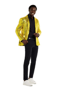 A smiling man stands confidently, wearing the Sequins Blazer Yellow by Suitmeister over a black shirt and pants, paired with white sneakers. He poses against a plain white background.